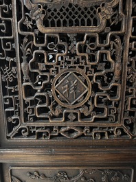 Four Chinese carved and openworked wooden doors, early 20th C.