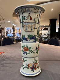 A pair of Chinese wucai 'gu' vases with narrative design, Transitional period