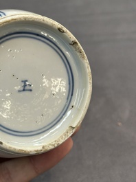 A pair of Chinese blue and white 'Long Eliza' vases and covers, jade mark, Kangxi
