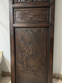 Four Chinese carved and openworked wooden doors, early 20th C.