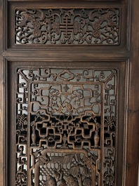 Four Chinese carved and openworked wooden doors, early 20th C.