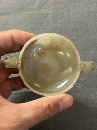 Two Chinese celadon jade censers, a snuff bottle and a two-handled cup, Ming and later