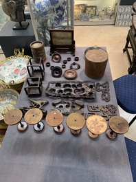 A large collection of 103 Chinese wooden stands, covers and other wood works, 19/20th C.