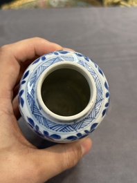 A pair of Chinese blue and white 'Long Eliza' vases and covers, jade mark, Kangxi