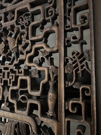 Four Chinese carved and openworked wooden doors, early 20th C.