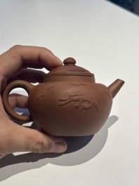 Three Chinese Yixing stoneware teapots and covers, 18th C.