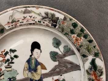 A Chinese famille verte 'lady and playing boy' plate, Kangxi