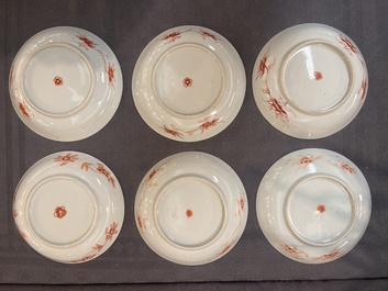 A set of 12 Chinese famille verte cups and saucers with floral design, Kangxi