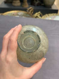 A Roman glass bottle with a conical neck, 4/5th C.