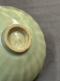 A Chinese Longquan celadon 'lotus' bowl and a large green-glazed jar, Ming and later