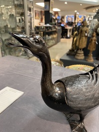 A Chinese bronze duck-form incense burner, Ming