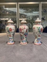 A Chinese famille rose 'birds' garniture with five vases, Qianlong