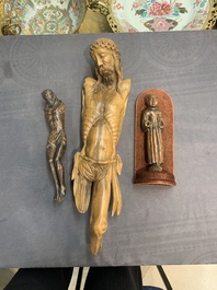 Two carved wooden Corpi Christi and a figure of a monk, Spain and Goa, 16th C.