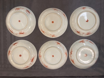 A set of 12 Chinese famille verte cups and saucers with floral design, Kangxi