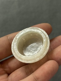 Two Chinese celadon jade censers, a snuff bottle and a two-handled cup, Ming and later