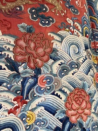 A fine Chinese gold thread embroidered red-ground silk noble lady&rsquo;s 'dragon' robe, 18/19th C.