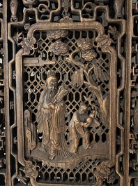 Four Chinese carved and openworked wooden doors, early 20th C.