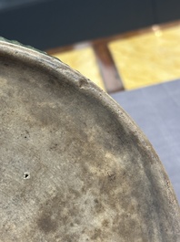 A Chinese Longquan celadon 'lotus' bowl and a large green-glazed jar, Ming and later