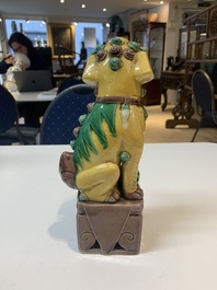 A pair of Chinese sancai-glazed rooftiles, a pair of Buddhist lions and a warrior, Ming and later