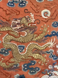 A fine Chinese gold thread embroidered red-ground silk noble lady&rsquo;s 'dragon' robe, 18/19th C.
