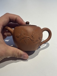 Three Chinese Yixing stoneware teapots and covers, 18th C.