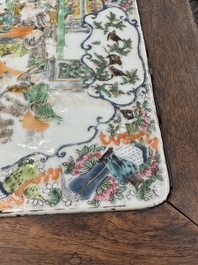 A pair of Chinese famille verte 'narrative' plaques mounted in hardwood tables, 19th C.