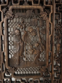 Four Chinese carved and openworked wooden doors, early 20th C.