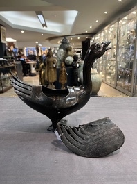 A Chinese bronze duck-form incense burner, Ming