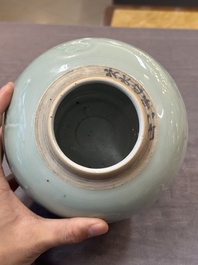 A Chinese celadon-glazed 'dragon' jar with reticulated wooden cover and stand, Qianlong