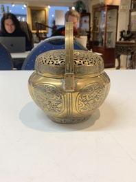 A Chinese bronze 'landscape' handwarmer, Qiu Fuxi 丘福禧 mark, 19th C.