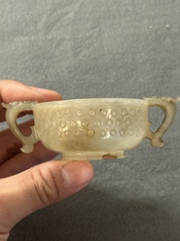 Two Chinese celadon jade censers, a snuff bottle and a two-handled cup, Ming and later