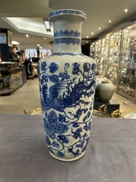 A Chinese blue and white 'phoenix and peony scroll' rouleau vase, Kangxi