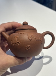 Three Chinese Yixing stoneware teapots and covers, 18th C.