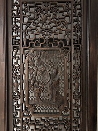 Four Chinese carved and openworked wooden doors, early 20th C.
