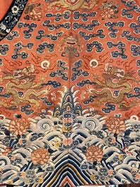A fine Chinese gold thread embroidered red-ground silk noble lady&rsquo;s 'dragon' robe, 18/19th C.