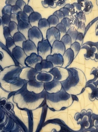 A Chinese blue and white 'phoenix and peony scroll' rouleau vase, Kangxi