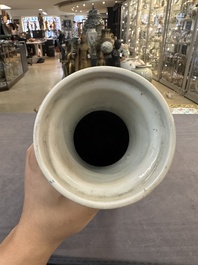 A Chinese blue and white 'phoenix and peony scroll' rouleau vase, Kangxi