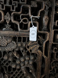 Four Chinese carved and openworked wooden doors, early 20th C.