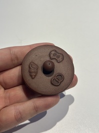 Three Chinese Yixing stoneware teapots and covers, 18th C.
