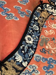 A fine Chinese gold thread embroidered red-ground silk noble lady&rsquo;s 'dragon' robe, 18/19th C.
