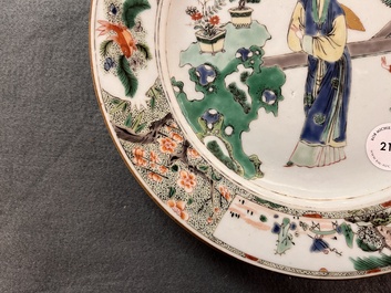 A Chinese famille verte 'lady and playing boy' plate, Kangxi