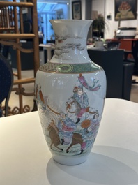 A Chinese famille rose vase with figural design, Qianlong mark, 19th C