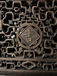 Four Chinese carved and openworked wooden doors, early 20th C.