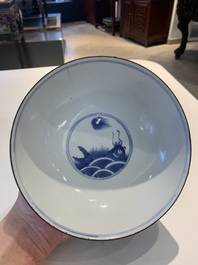 A Chinese blue and white 'Bleu de Hue' 'roosters and chick' plaque in a carved wooden screen and a bowl, 19th C.