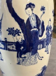 A Chinese blue and white vase with ladies and playing boys in a garden, 19th C.