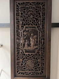 Four Chinese carved and openworked wooden doors, early 20th C.