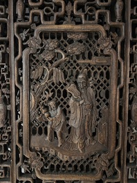 Four Chinese carved and openworked wooden doors, early 20th C.