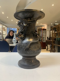 A Chinese archaistic bronze gold-splashed 'dragon' vase, Dong 東 mark, Ming