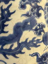 A Chinese blue and white 'phoenix and peony scroll' rouleau vase, Kangxi
