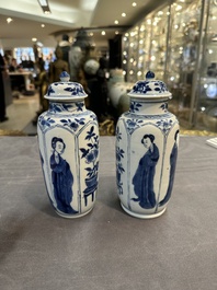 A pair of Chinese blue and white 'Long Eliza' vases and covers, jade mark, Kangxi